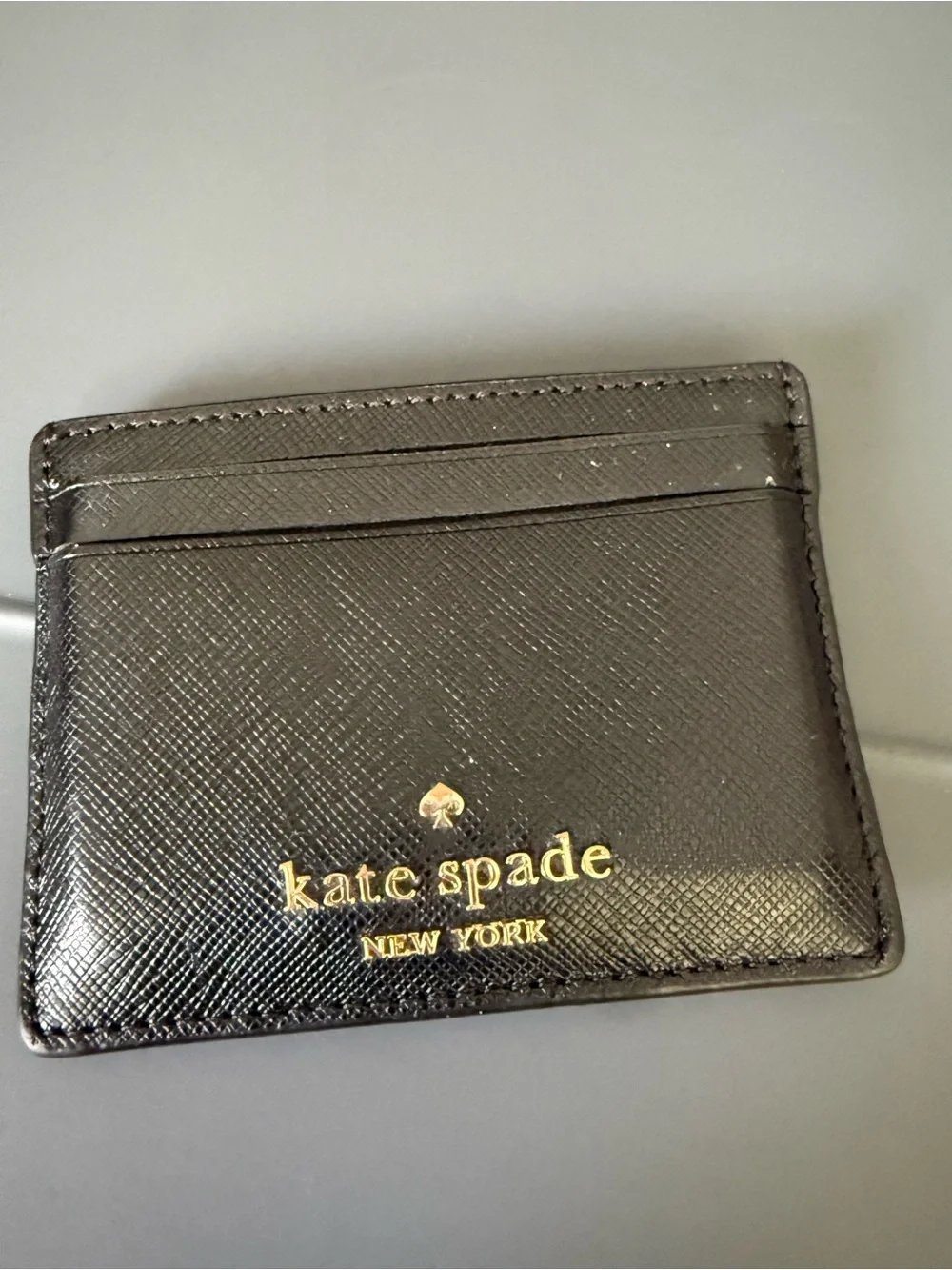 kate spade black patent card holder with gold logo